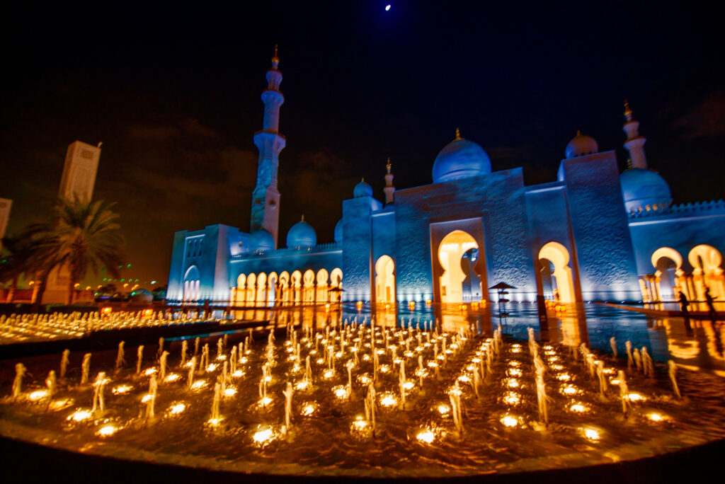 Exterior view of Sheikh Zayed Mosque in Abu Dhabi at night, UAE. Depositphotos