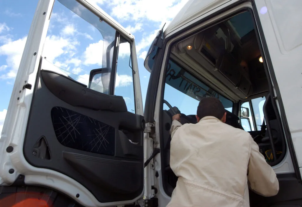 a driver of a truck, Depositphotos