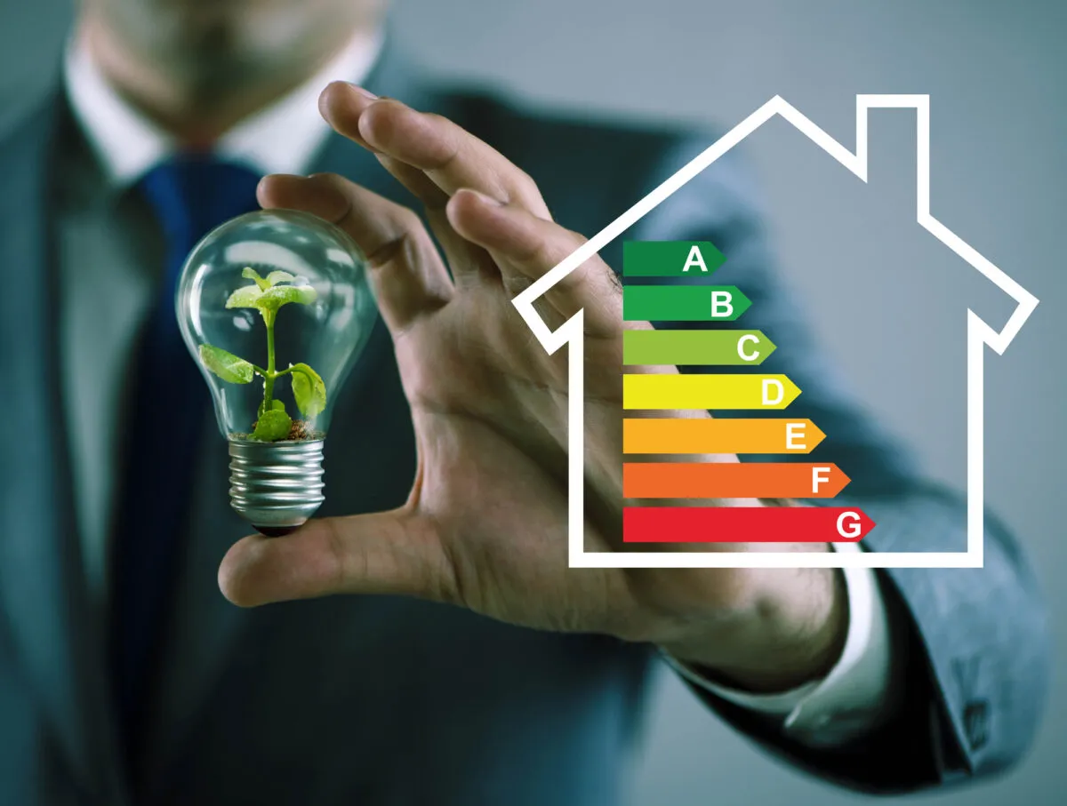 Businessman in energy efficiency concept Depositphotos