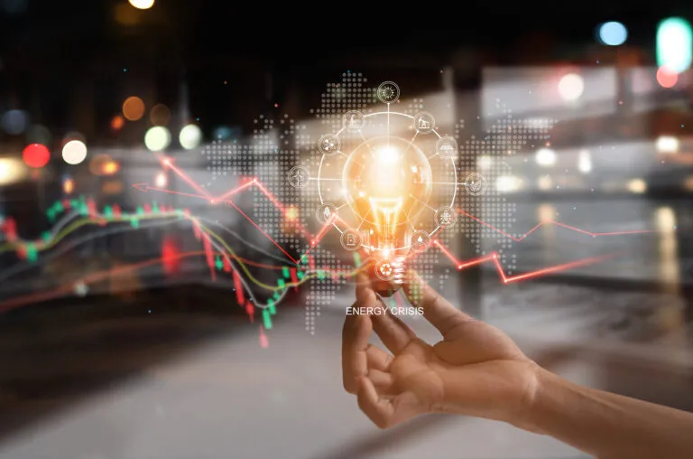 Energy crisis, Hand hold light bulb with energy resources, Depositphotos