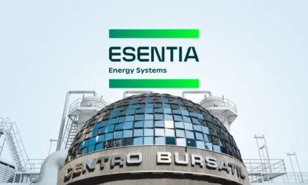 ESENTIA Energy Systems logo with a green gradient bar above, set against a light blue background with a glass-paneled dome building.