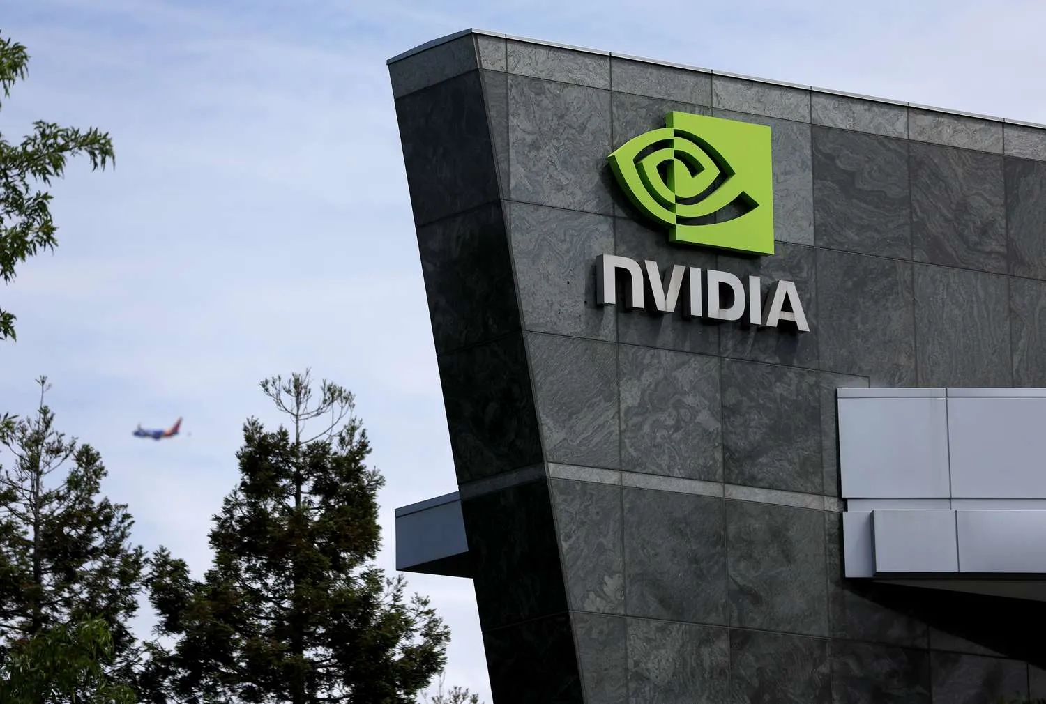 NVIDIA logo on a dark gray stone building exterior