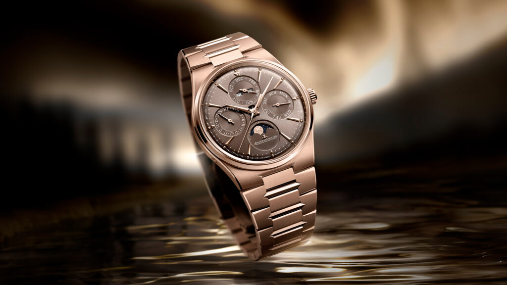 2026_q417216j_master_cc_qp_or_levitation_srgb_16-9 - Petróleo y Energía Luxury rose-gold wristwatch with multiple subdials reflected on a glossy surface