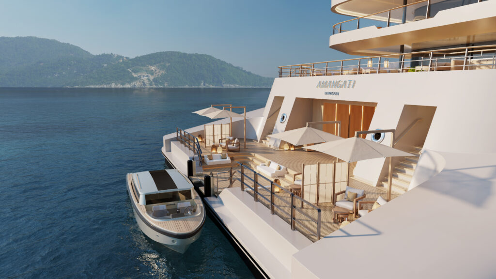 Amangati Aman at Sea - Marina 05 1 - Petróleo y Energía Luxurious yacht deck with seating, umbrellas, and sun loungers along the waterfront vessel