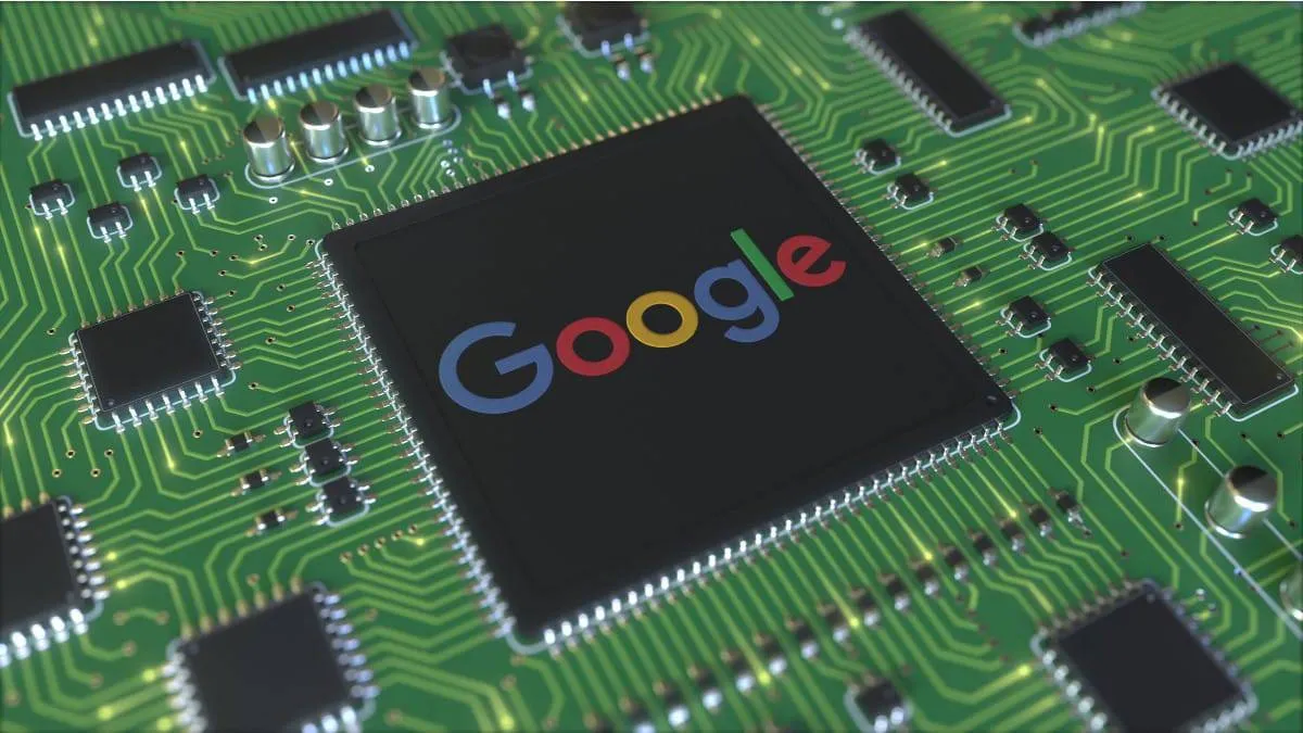 Google logo displayed on a green printed circuit board with integrated chips and circuitry panels, representing tech or AI hardware.