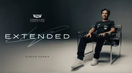 Checo Pérez seated in a chair for Cadillac Formula 1 Team, with the word EXTENDED and logo in a dark gradient background.