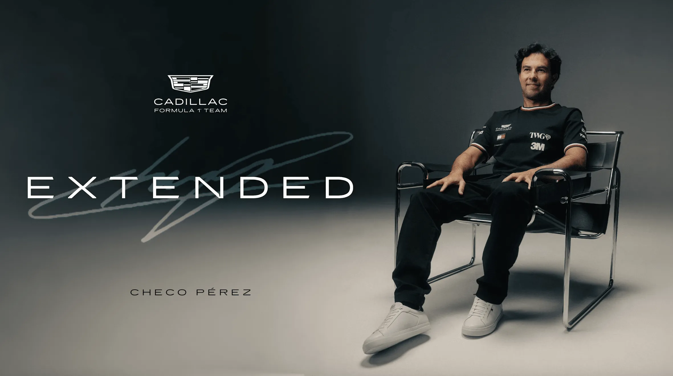 Checo Pérez seated in a chair for Cadillac Formula 1 Team, with the word EXTENDED and logo in a dark gradient background.